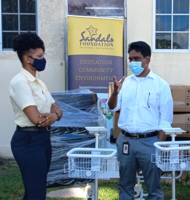 Savanna-la-Mar Hospital’s Senior Medical Officer, Dr. Suman Vemu (right), shares the benefits of the much-needed medical equipment and supplies donated by the Sandals Foundation with Regional Public Relations Manager for Sandals and Beaches Negril, Jervene Simpson (left). Dr. Vemu expressed his gratitude for the support from the Foundation.