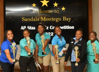 The Phoenix team, champions of the Sandals Montego Bay All Stars Quiz Competition show off the hardware. From (left to right) are: Veronica Campbell, Althea Walker-Mighty, Daniella Sterling, Shantoy Blaygrove, Amanda Mitchell and Shannakay Spence.