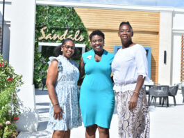 Ms. Pameto Linton and Charmaine Samuels, educators from the New Works Primary School, are pictured here beaming with happiness after their names were picked in a grand raffle draw for a weekend for 2 each at any local Sandals or Beaches Resort. They are seen here with Jennese Palmer, Public Relations Manager at Sandals South Coast after the presentation was made to them at a Teacher’s Day luncheon.