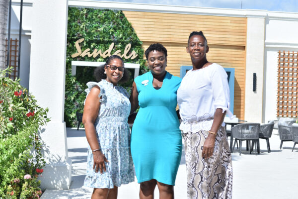 Ms. Pameto Linton and Charmaine Samuels, educators from the New Works Primary School, are pictured here beaming with happiness after their names were picked in a grand raffle draw for a weekend for 2 each at any local Sandals or Beaches Resort. They are seen here with Jennese Palmer, Public Relations Manager at Sandals South Coast after the presentation was made to them at a Teacher’s Day luncheon. 