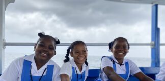 Grade 4 students (from left) Akayla Forrester, Tessania Tulsie and Sonia Spence from Broughton Primary School, Westmoreland shared bright smiles for the camera as they headed to sea with the Beaches Negril watersports team for a glass bottom boat tour and lessons on different types of sea creatures and the importance of taking care of the ocean.
