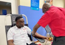 (From left) Beaches Negril Front Desk Agents, Donovan Miller and Sidean Quarry were hydrated and ready to donate at the recent blood donation initiative held on resort.