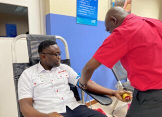 (From left) Beaches Negril Front Desk Agents, Donovan Miller and Sidean Quarry were hydrated and ready to donate at the recent blood donation initiative held on resort.