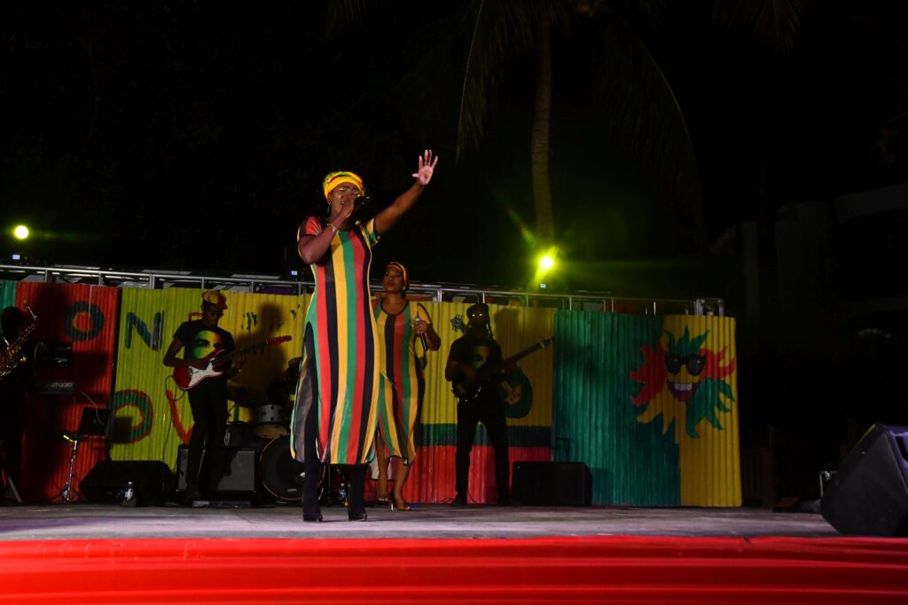 Shamoya Davis from Beaches Negril serenades the audience with classic Reggae songs.