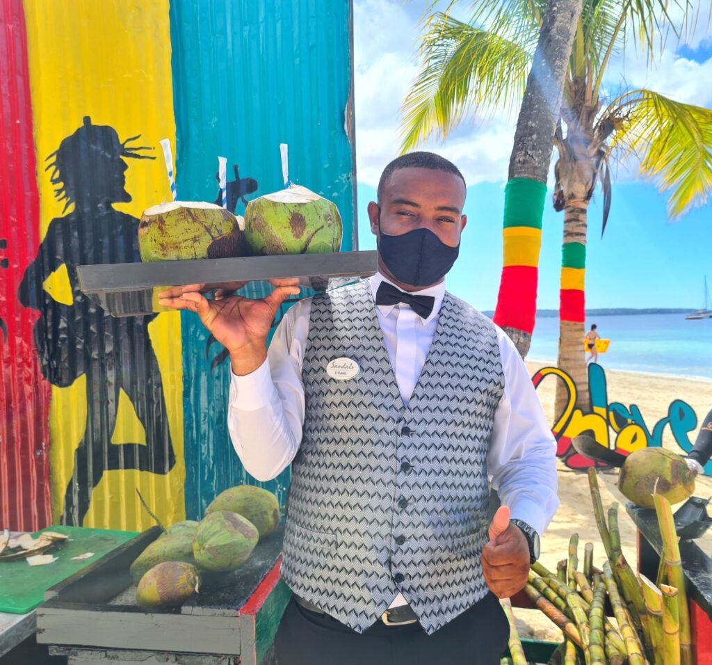 Sandals Negril’s Butler, O’Dane Francis knows nothing cools you down like Coconut water.