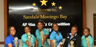 The Phoenix team, champions of the Sandals Montego Bay All Stars Quiz Competition show off the hardware. From (left to right) are: Veronica Campbell, Althea Walker-Mighty, Daniella Sterling, Shantoy Blaygrove, Amanda Mitchell and Shannakay Spence.