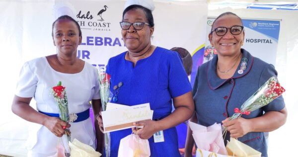 Director of Nursing Services, Matron Maria Stampp (center) has given over 37 years of service to the nursing profession. She is joined by her colleagues; Deputy Director of Nursing Services, Ingrid Stephens (left) and Nurse Anaesthetist, Andrea Wright who have both served for 28 years. All three nurses were honoured by Sandals South Coast during a Nurses Week activity recently. 