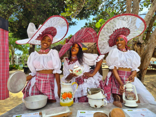 (From left) Calantha Braham, Cadesha Smith and Shyanne Miller from the Beaches Negril entertainment team shared bright smiles with the camera as they taught guests and team members about common heirlooms that can be found in the Jamaican household.