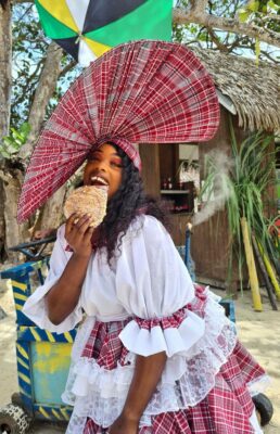 Cadesha Smith from the Beaches Negril entertainment team captured while sharing on the gizzada, a Jamaican delicacy during a taste of Jamaica cooking segment.