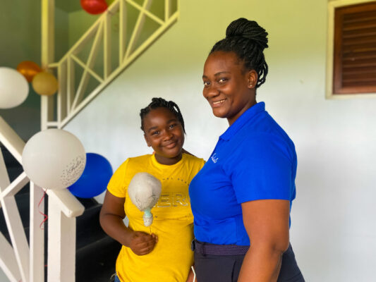 Income Auditor at Sandals Negril, Monique Monroe with daughter Monecia Warren.