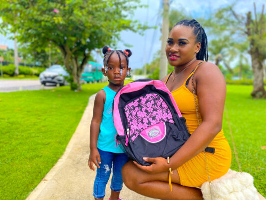 Sandals Negril Housekeeper, Kamoy Gopie shares lens with daughter, Kelly Dale at the resort’s back-to-school fair.   