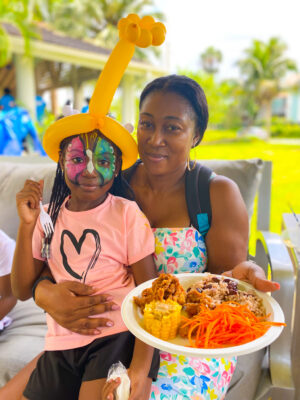 Nadine Morris from the Sandals Negril housekeeping team shares a quick meal with daughter Kaydeen Satahoo.