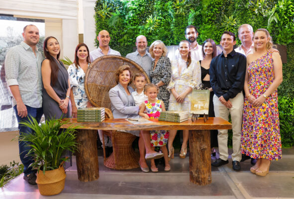 Philanthropist and Chair of Stewart’s Automotive Group, Diana Stewart (seated) is joined by members of her family during the launch of her first literary work, Dunsinane: A Memoir. Mrs. Stewart, who penned the piece in memory of her late husband Richard, hosted the prestigious event at the Jaguar Land Rover Showroom on September 28 - the eve of the seven-year memorial of Richard Stewart’s passing.