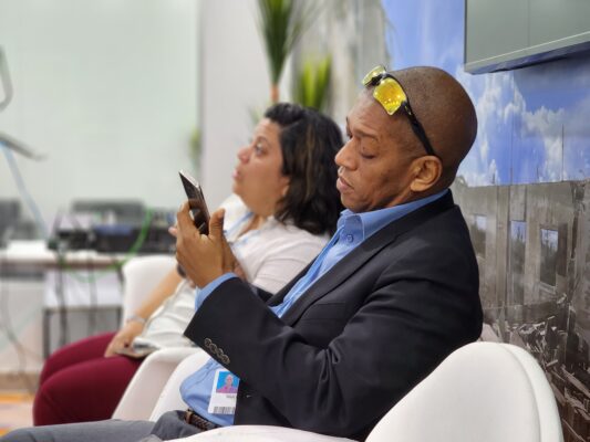 Dr Mark Bynoe and colleague at the Caribbean Community Climate Change Centre, Ethlyn Valladeres, take a breather in the Caribbean Pavilion at the UN Climate Talks which got underway in Egypt today (Monday, November 7, 2022).