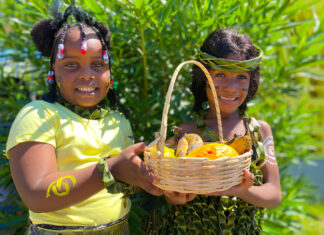 (from left) Arianna Whittingham and J’Heneilia Powell from Mount Airy Infant School were clad in their depiction of the Tianos at the school’s recently held heritage day celebration.