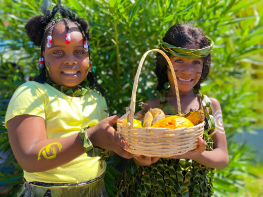 (from left) Arianna Whittingham and J’Heneilia Powell from Mount Airy Infant School were clad in their depiction of the Tianos at the school’s recently held heritage day celebration.