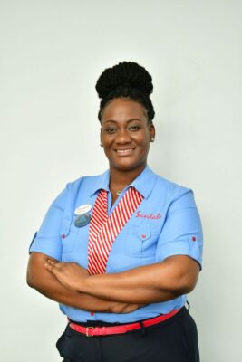 Income auditor at Sandals Negril, Monique Munroe flashes her typical bright smile our way.