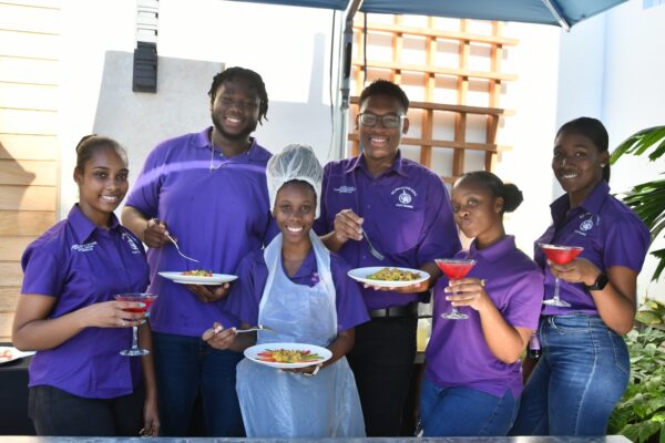 One team of student leaders from A.Z. Preston Hall, UWI (Mona) show off the lovely dishes and cocktails they created during a team building exercise at Sandals South Coast. 