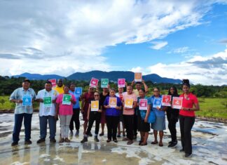 A key part of the assessments done in the twenty communities explored awareness of the Sustainable Development Goals (SDGs) and actions being done to incorporate them into community development. Here indigenous people from the Surama Village in Guyana share cards with the 17 SDGs.