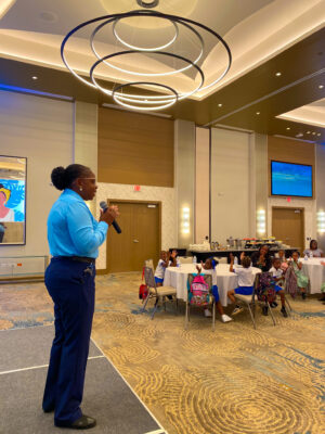 : Environment, Health and Safety Manager at Sandals South Coast Vilma Smith engages the competitors for the Inter-School Literacy Competition in a story time and motivational session.