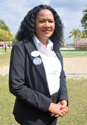 Shernet Bailey (left) manager at the Sandals Central Laundry and Assistant Manager Sonita Danhi pause from their leadership duties as they share a moment with the camera