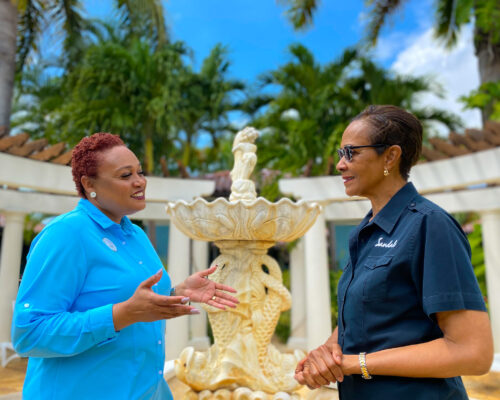 Tamika Robb-Scott shares a light moment with Group Manager for the Red Lane spa, Paulette King.