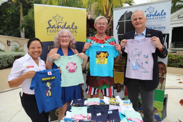 The Craig’s Family remain major donors to the Sandals Foundation for many years, with this visit being no different (l-r) Lyndsay Isaacs, Regional Public Relations Manager, Elizabeth Crag, Gordon Craig and Sandals Resorts International Chief Executive Officer Gebhard Rainer sharing a moment at the Sandals Ochi Beach Resort